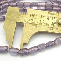 7mm Faceted Oval Czech Glass Beads, Amethyst AB Barrels