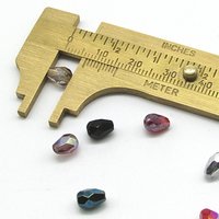 Light Amethyst AB 7x5mm Faceted Teardrops