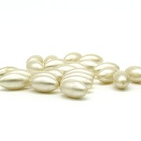 18.5x10mm Tapered Oval Plastic Beads, Vintage Cream Faux Pearls