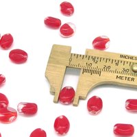 11x8.5mm Pinched Oval Beads with Red Givre