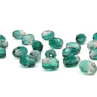 Faceted two-tone oval barrel beads measure 10mm long by 8mm wide, with 1mm center-drilled lengthwise holes. Fire polished Czech glass beads are a combination of translucent emerald green and light amethyst purple.