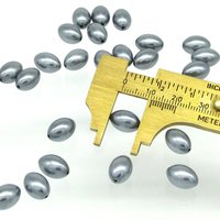 11.5x8mm Oval Pearlized Beads,  Vintage Dark Gray Tapered Barrels