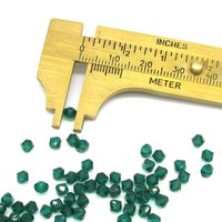 4mm Bicone Beads, Translucent Emerald Green Vintage Machine Cut Faceted Crystal Spacers