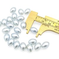 11.5x8mm Oval Rice Beads, Opaque Light Blue Vintage Faux Pearls