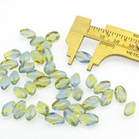 11x7mm Pinched Oval Beads, Baroque Barrels, Translucent Czech Pressed Glass