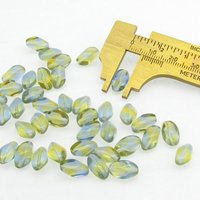 11x7mm Pinched Oval Beads, Baroque Barrels, Translucent Czech Pressed Glass