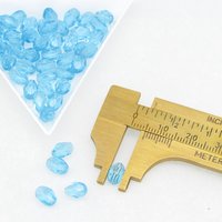7x5mm Faceted Ovals, Translucent Aqua Czech Fire Polished Beads (50)
