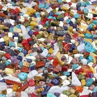 Vintage chip bead mix contains irregular nuggets of agate, jasper, amethyst, sodalite, aventurine, rhodolite, howlite, mother of pearl, shell, aventurine, coppery goldstone, and glass in a variety of colors.  Chips range in size from 4mm to 10mm.