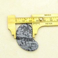 Width of the snowflake obsidian cabochon, as measured with a caliper.