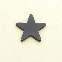 Vintage star shape cabochon is shiny, opaque black pressed glass measuring approximately 36.75mm across and 4.5mm thick.