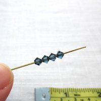 4mm Montana Sapphire Crystal Bicones