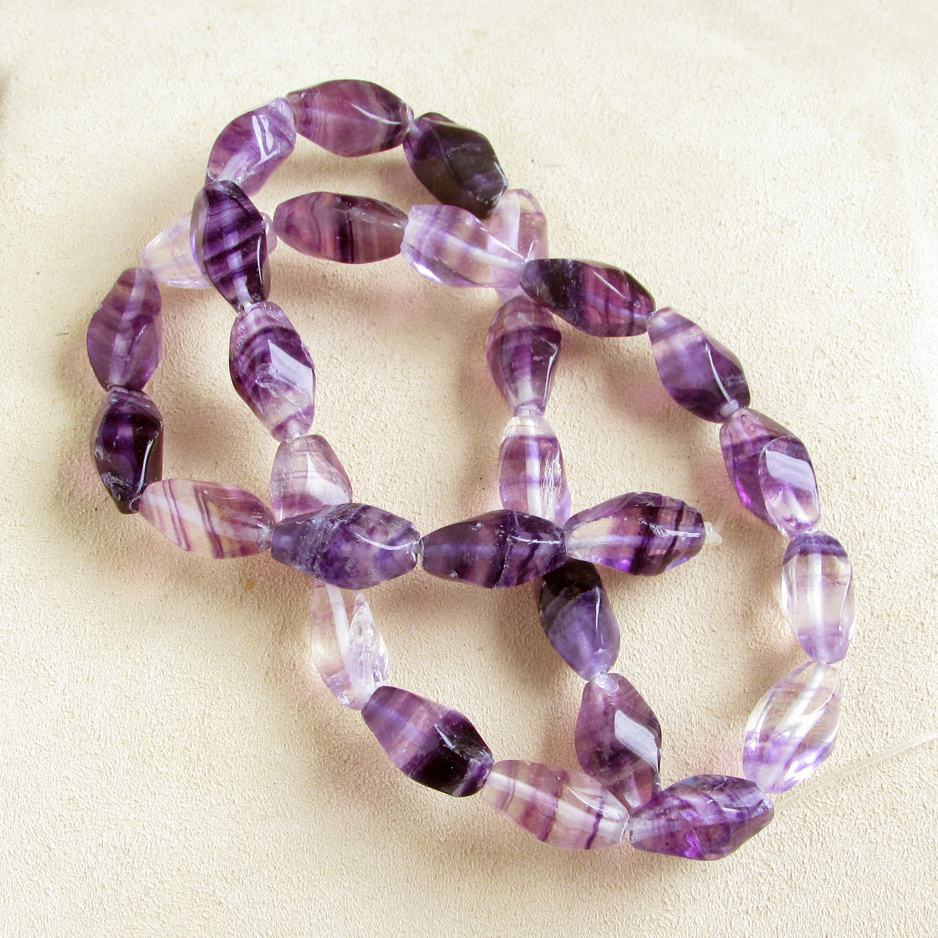 14x7mm Twisted Barrels, Polished Purple Fluorite Gemstone Beads