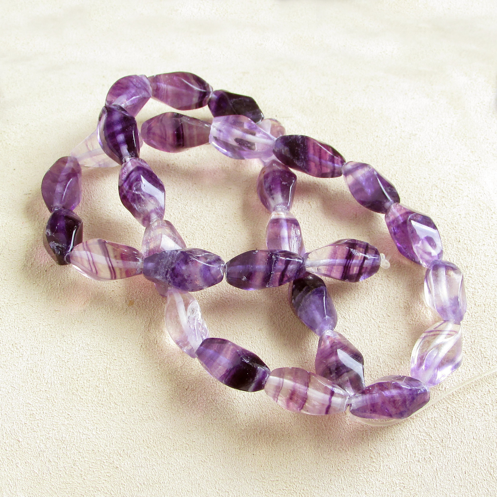 14x7mm Twisted Barrels, Polished Purple Fluorite Gemstone Beads