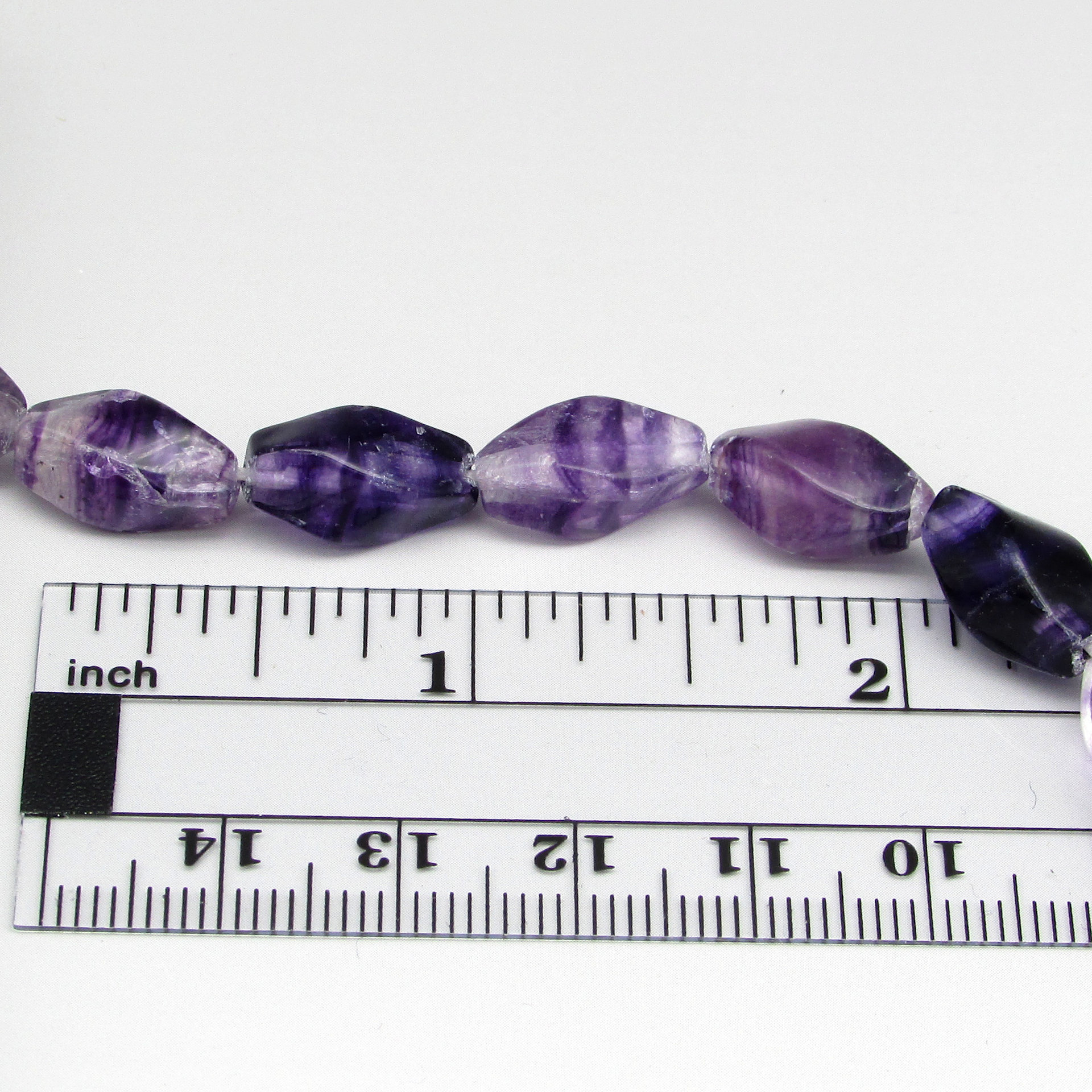 14x7mm Twisted Barrels, Polished Purple Fluorite Gemstone Beads