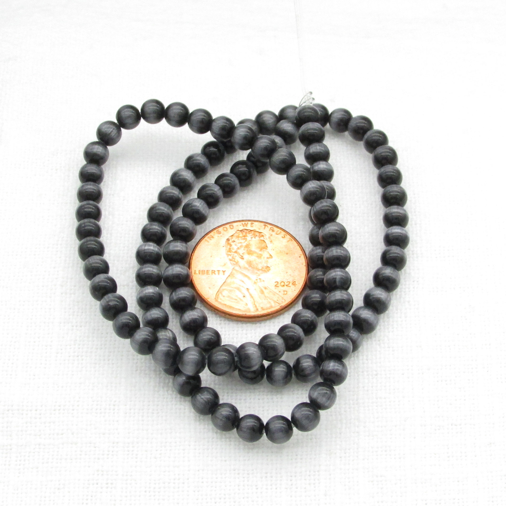 4mm Round Black Glass Cats Eye Beads