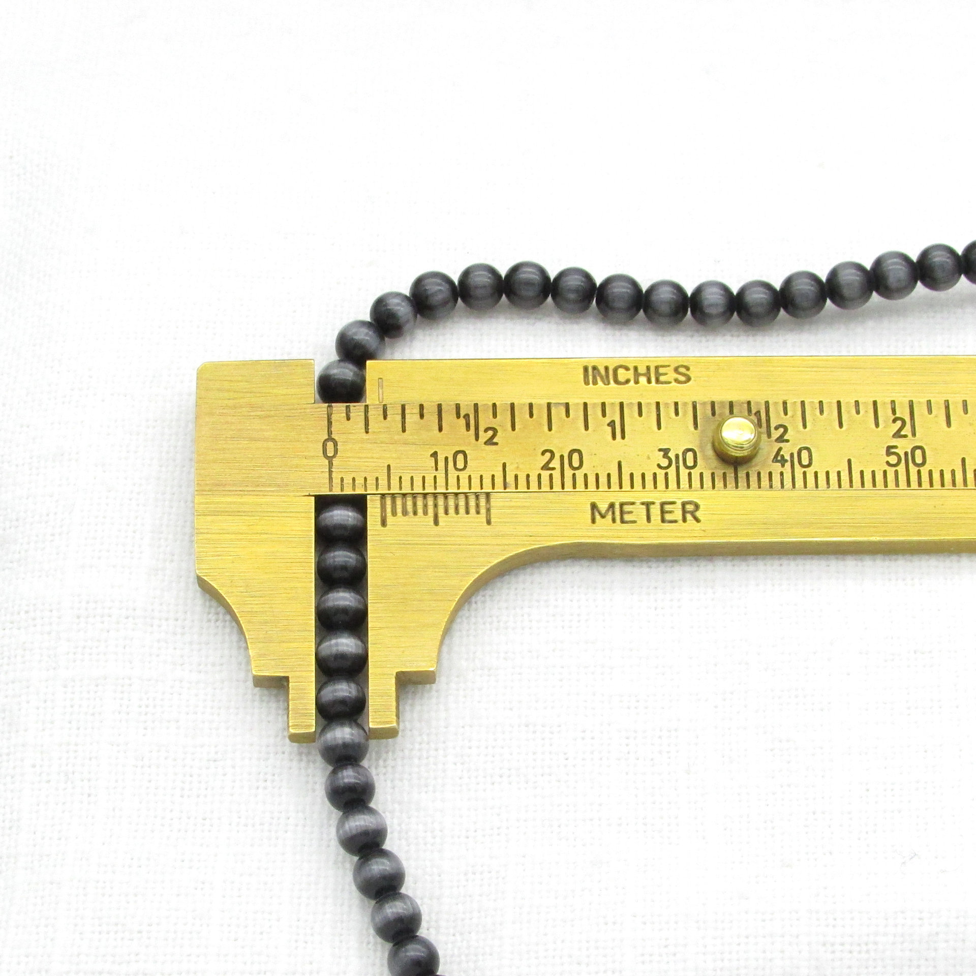 4mm Round Black Glass Cats Eye Beads