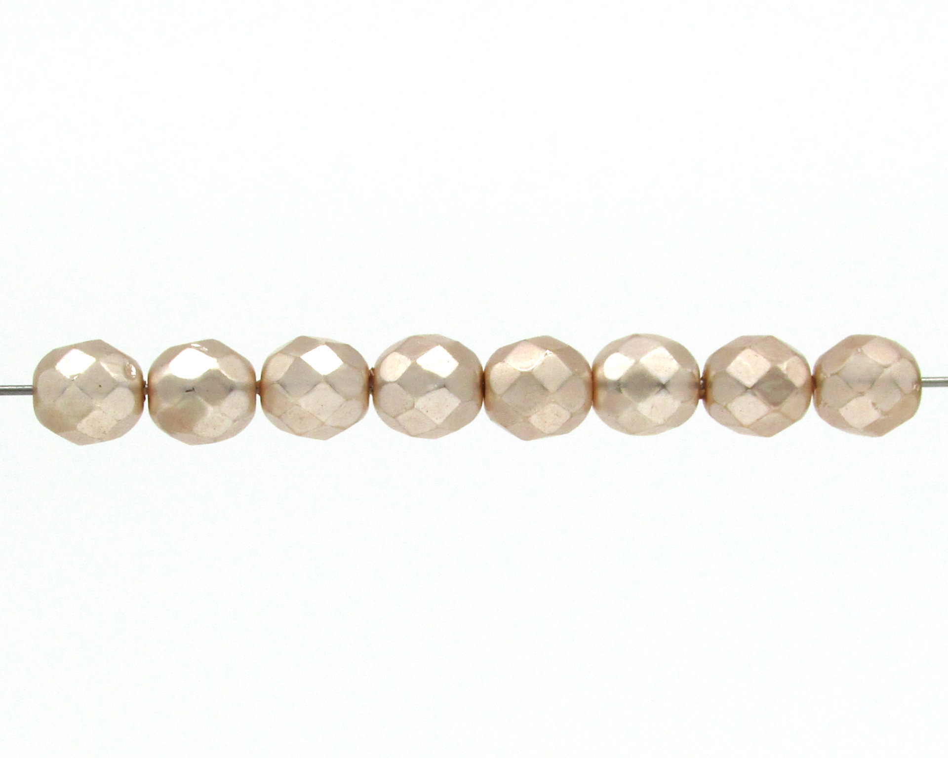 8.5mm Faceted Ovals, Pale Peach Pearlized Glass