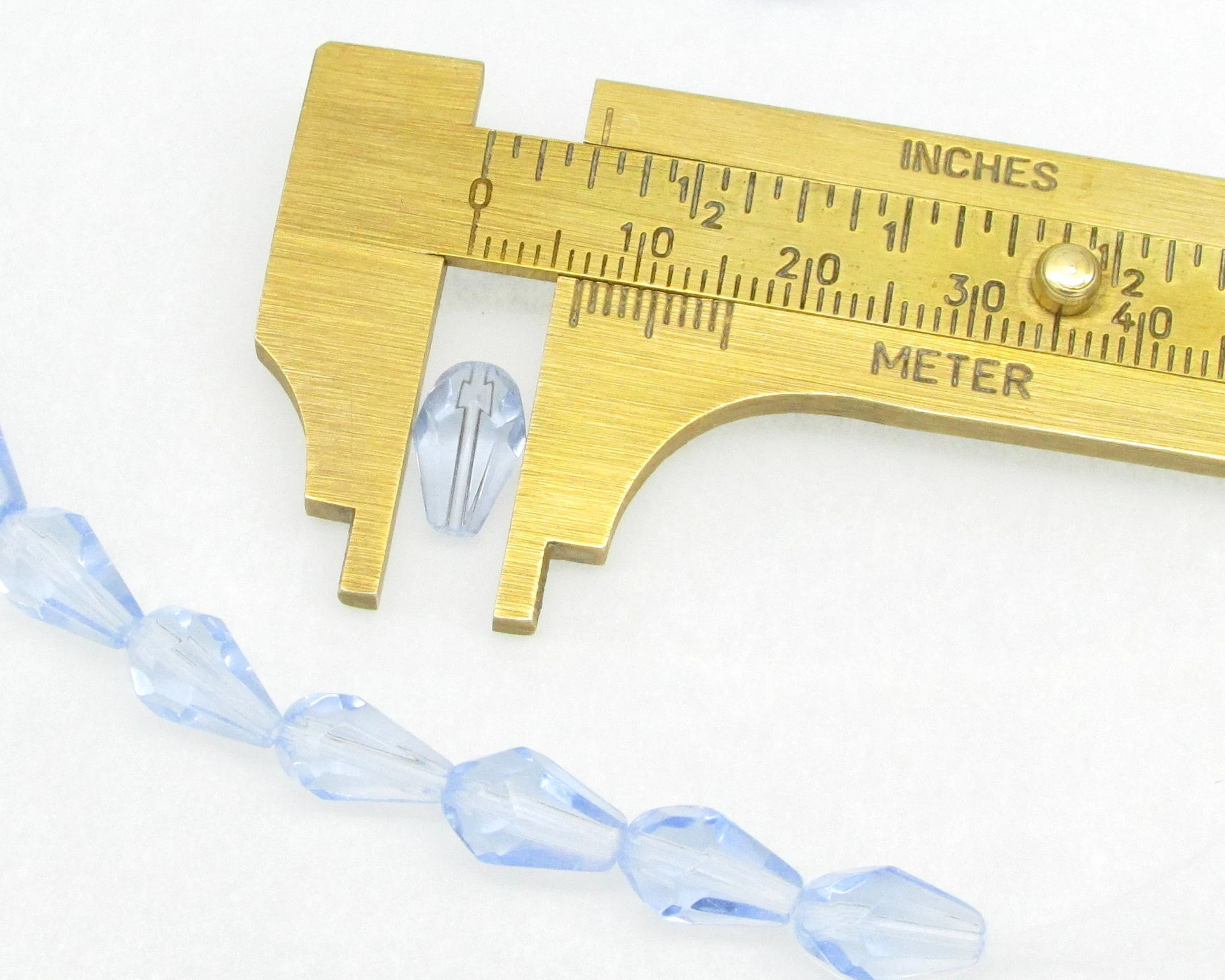 11x6.5mm Faceted Teardrops, Light Sapphire (35)