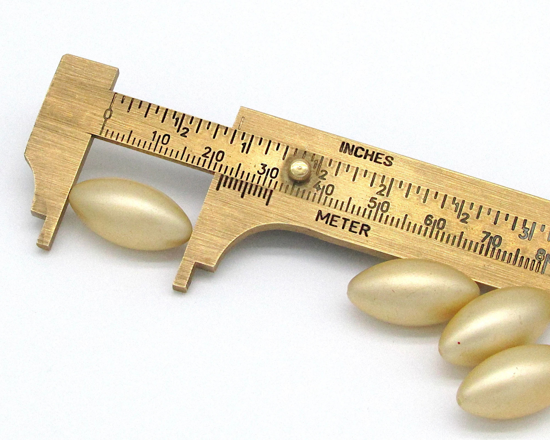 Vintage 23x12mm Oval Pale Gold Plastic Pearls