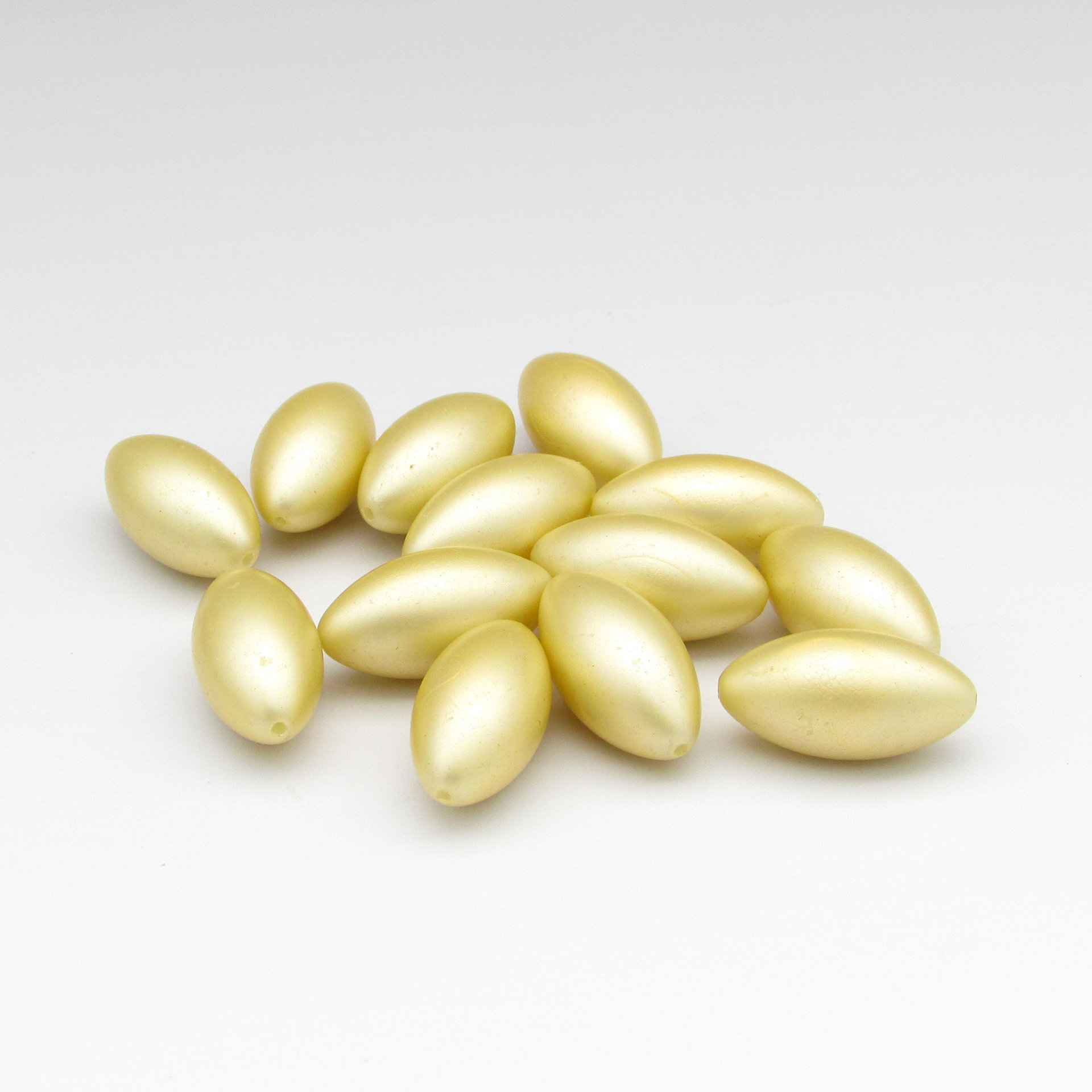 Vintage 23x12mm Oval Pale Gold Plastic Pearls