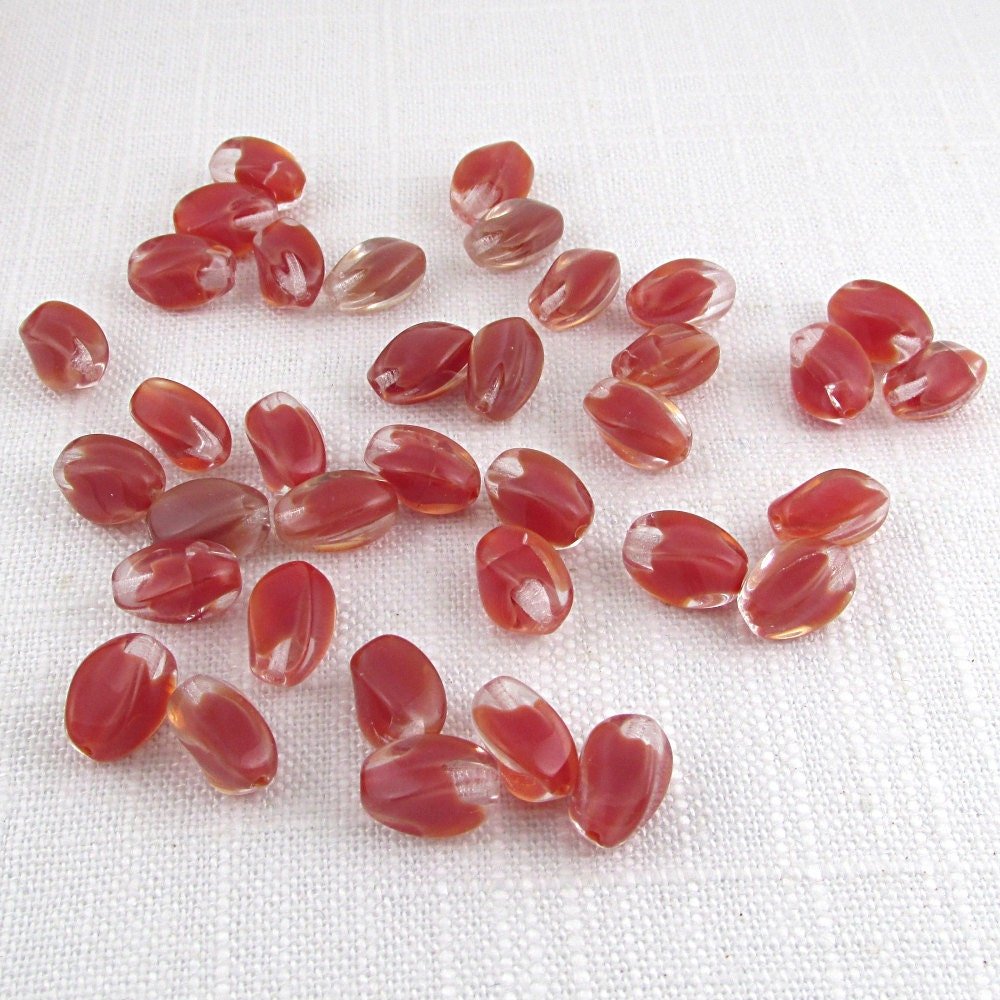 14mm Twisted Oval Beads with Watermelon Red Givre