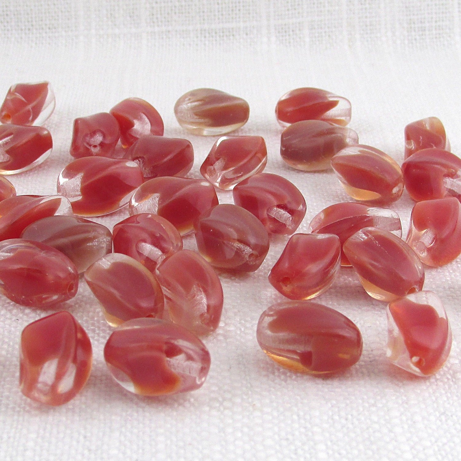 14mm Twisted Oval Beads with Watermelon Red Givre