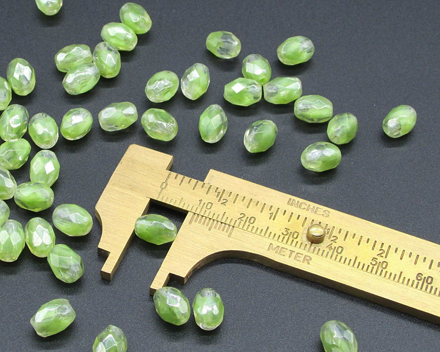 Vintage 9mm Faceted Oval Green Givre Beads