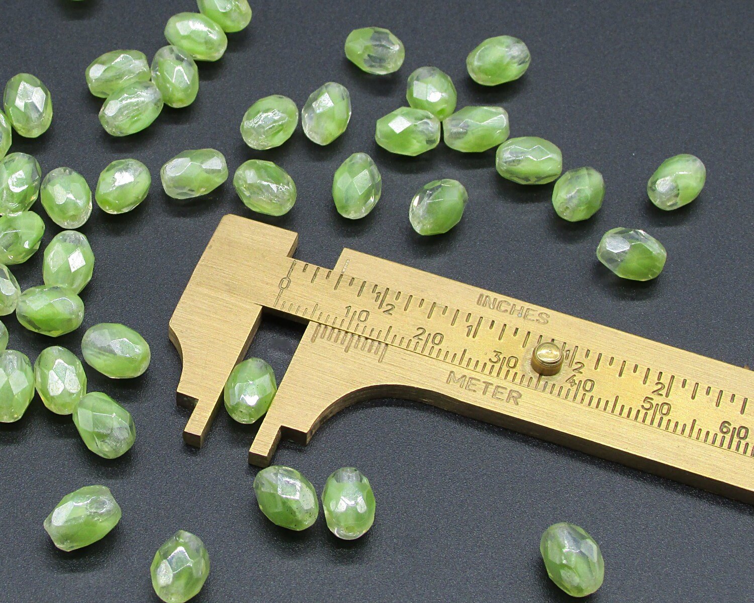 Vintage 9mm Faceted Oval Green Givre Beads