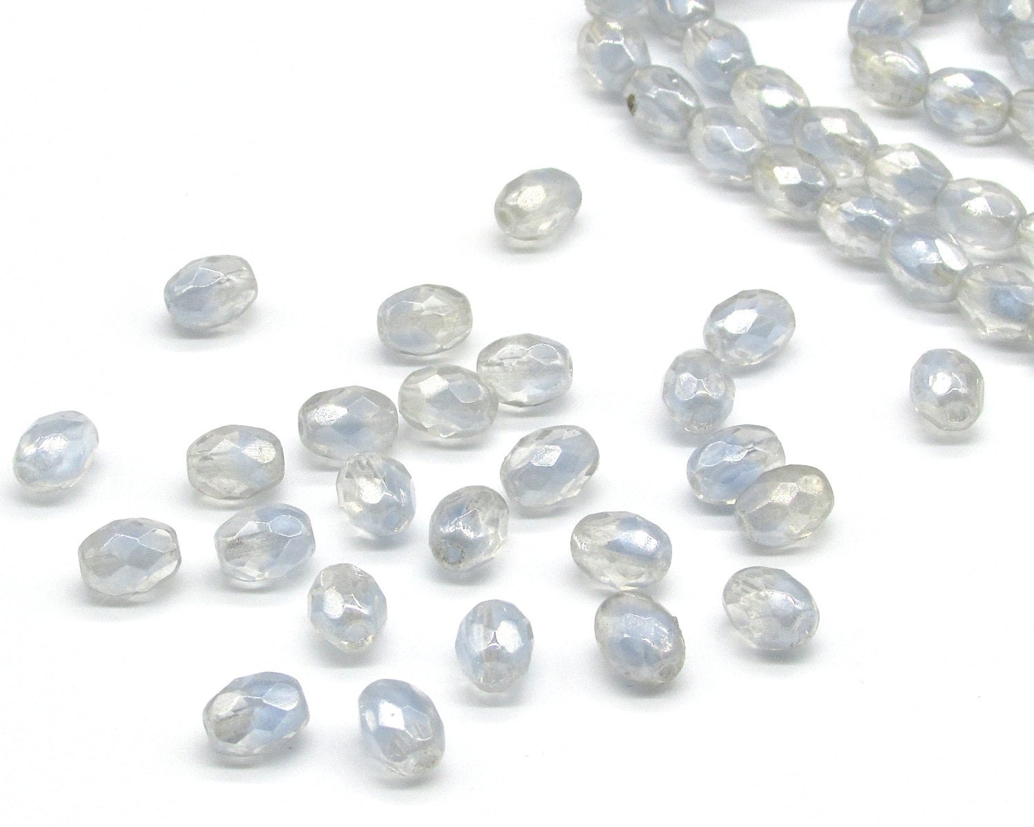 Vintage 9mm Faceted Oval Givre Beads