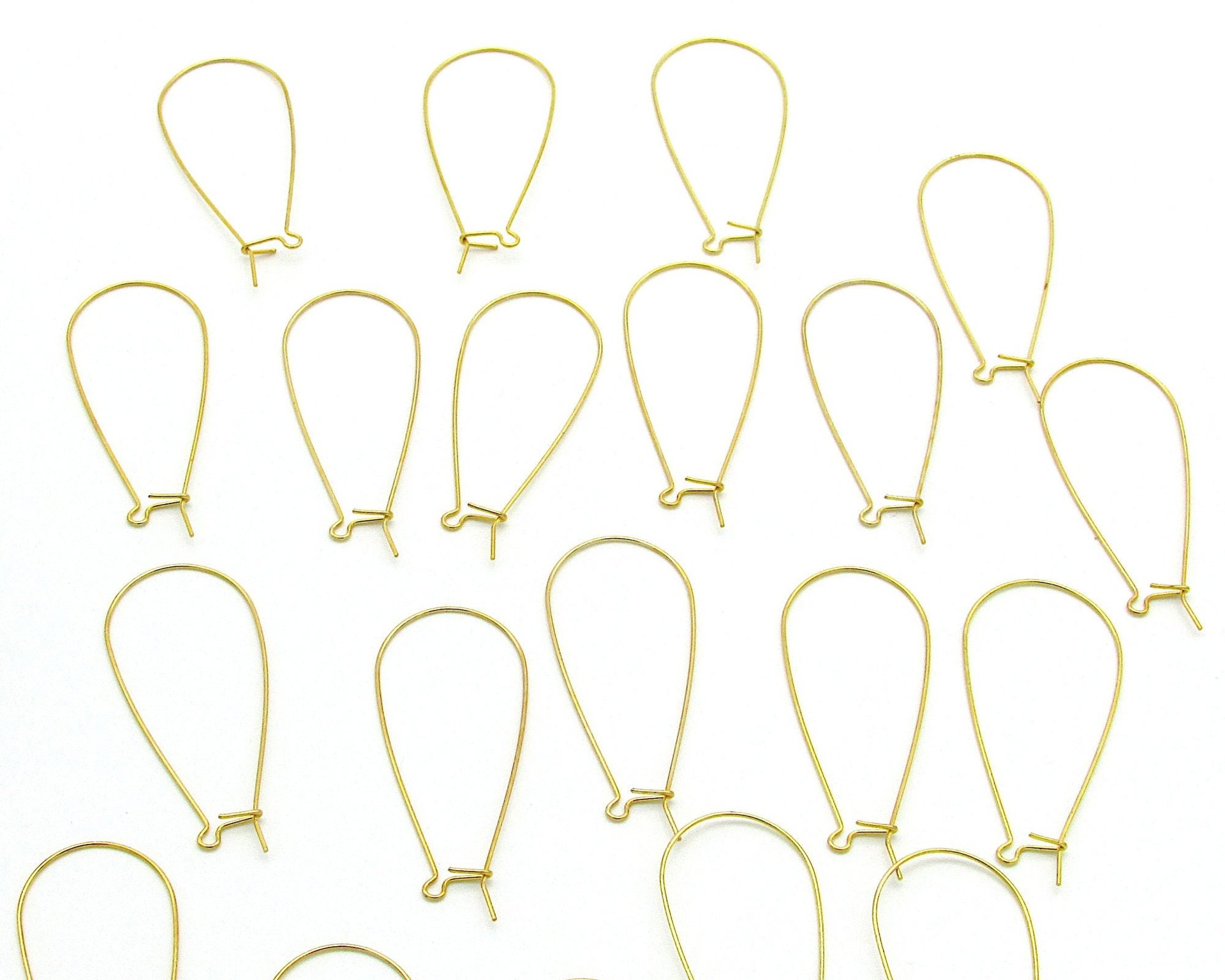 Large gold plated kidney ear wires measure 47mm from the top of the loop to the bottom latch,