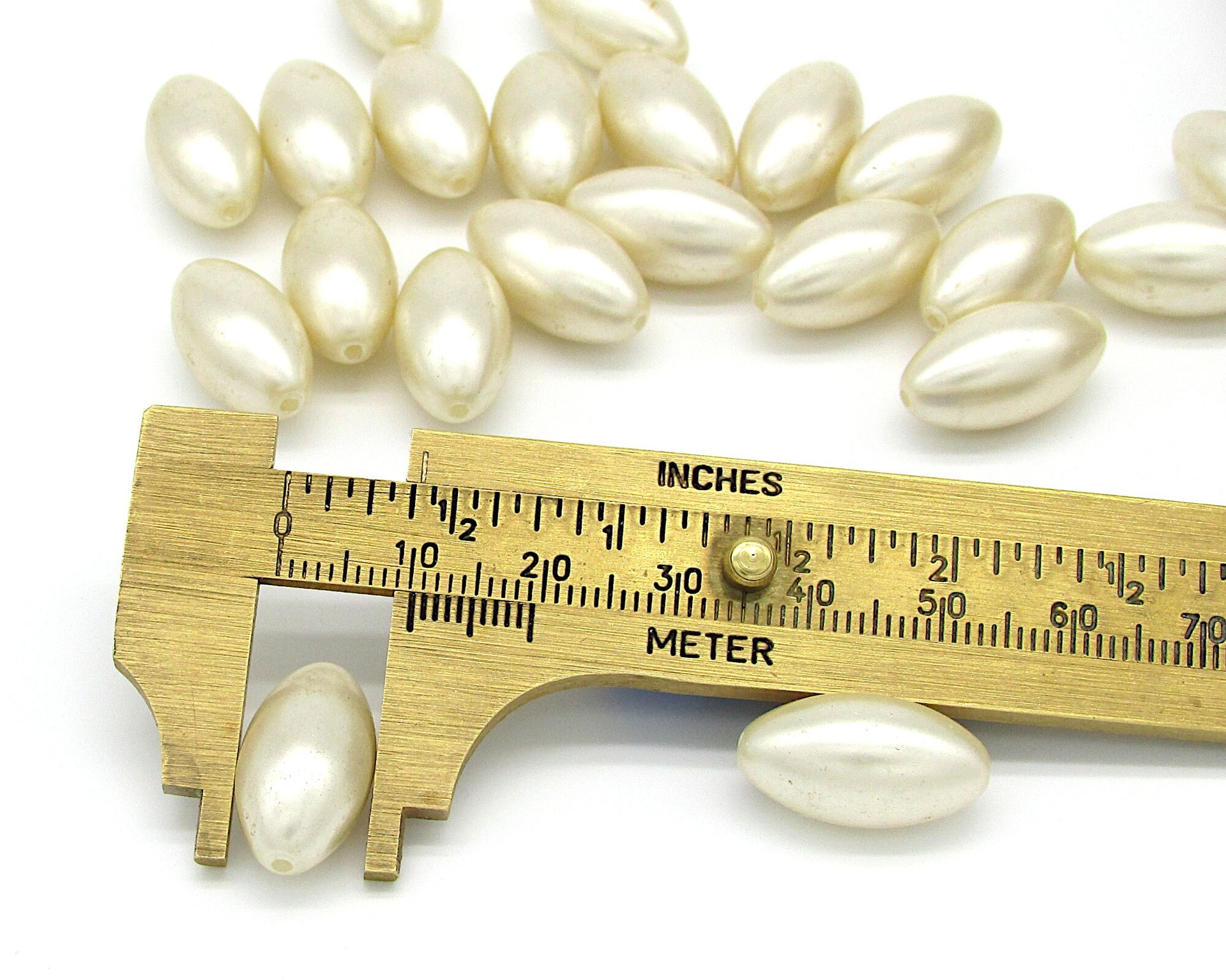 18.5x10mm Tapered Oval Plastic Beads, Vintage Cream Faux Pearls