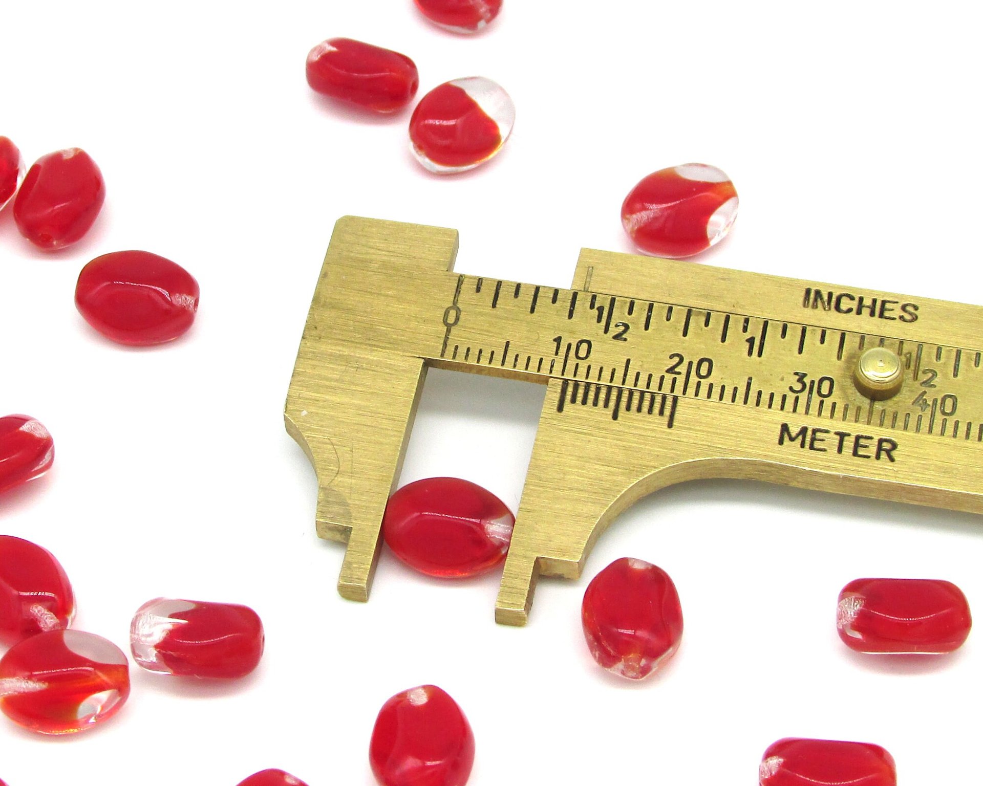 11x8.5mm Pinched Oval Beads with Red Givre