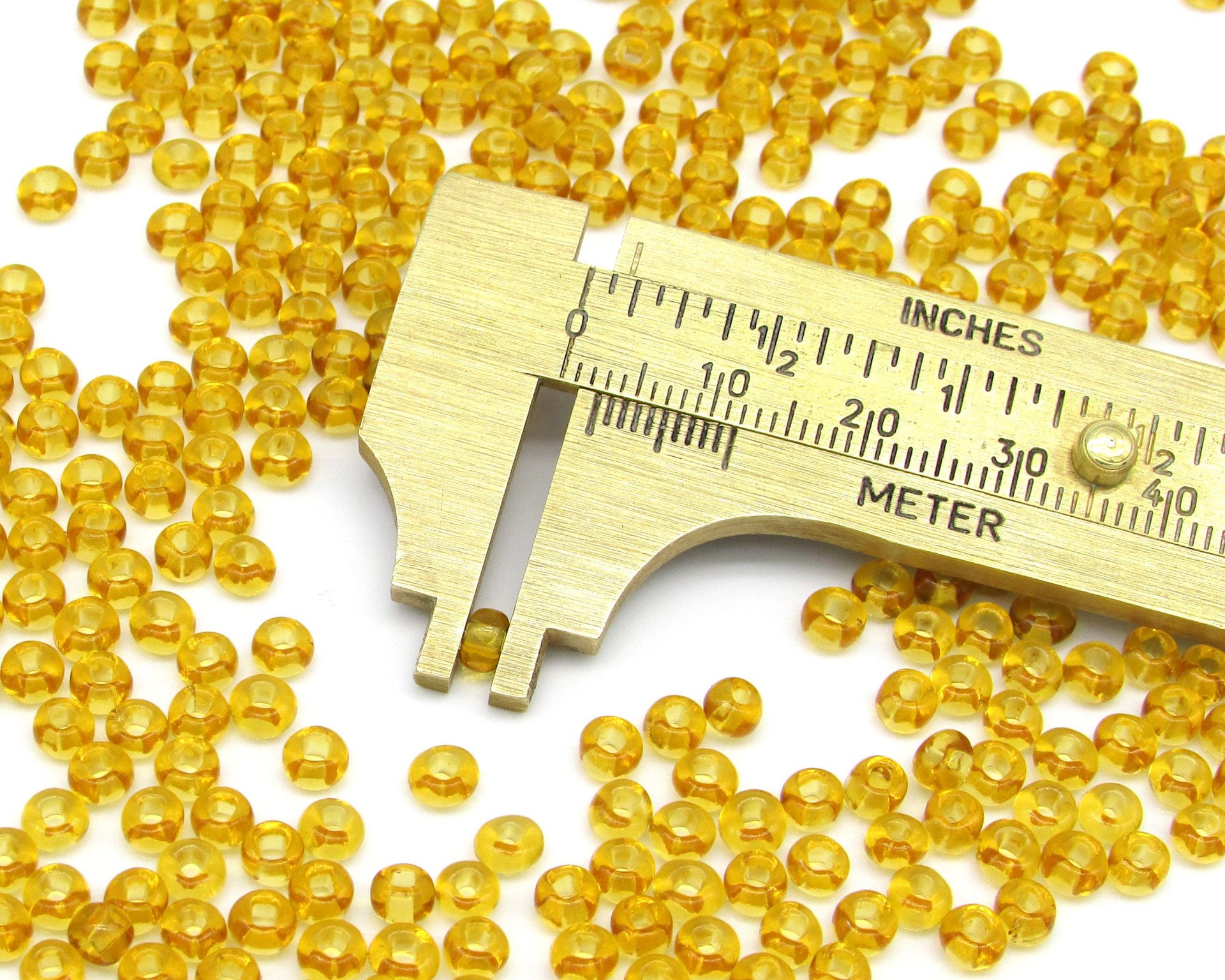 6/0 Translucent Topaz Mini Rocailles