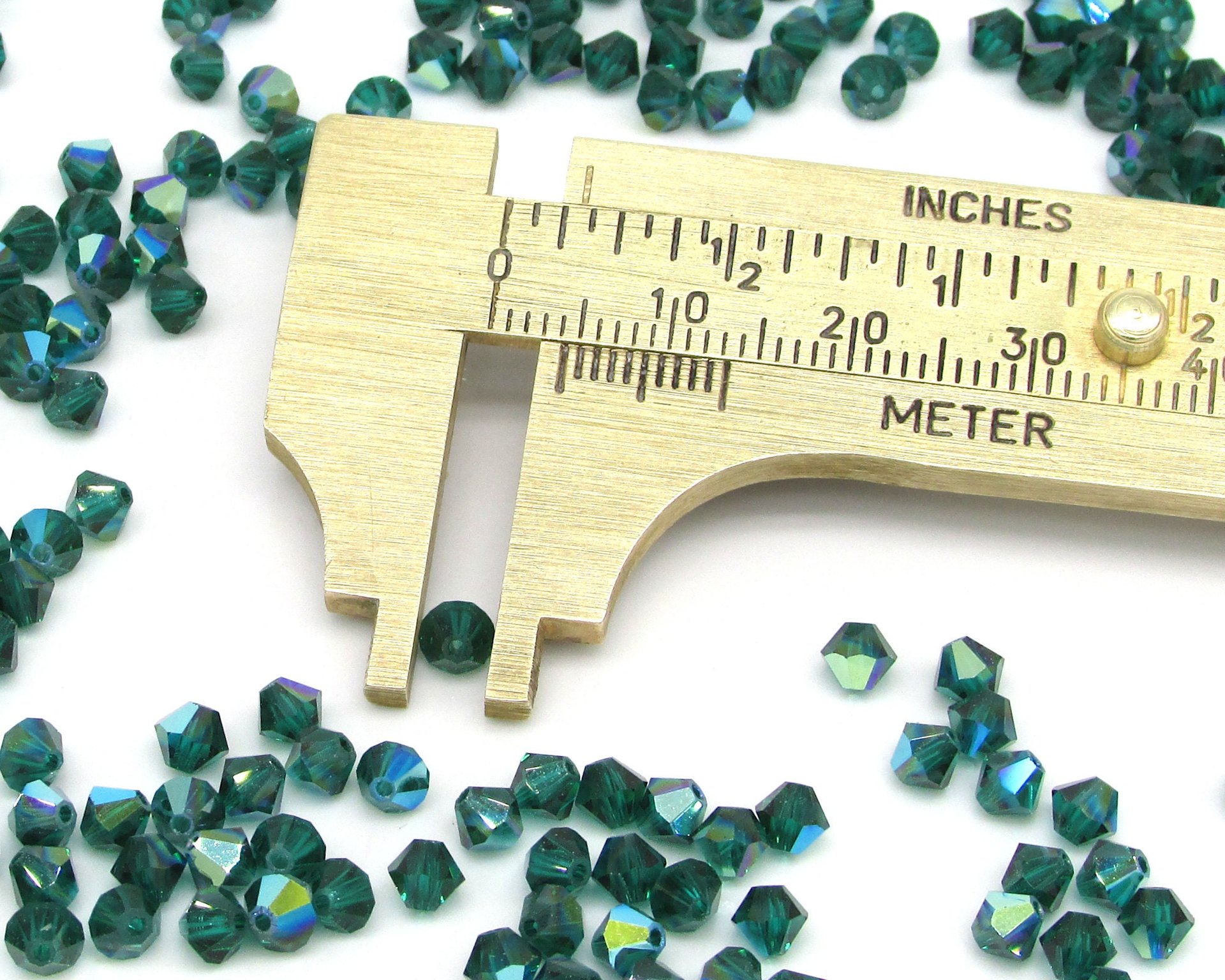 Vintage 4mm Bicone Beads, Emerald AB Machine Cut Crystal