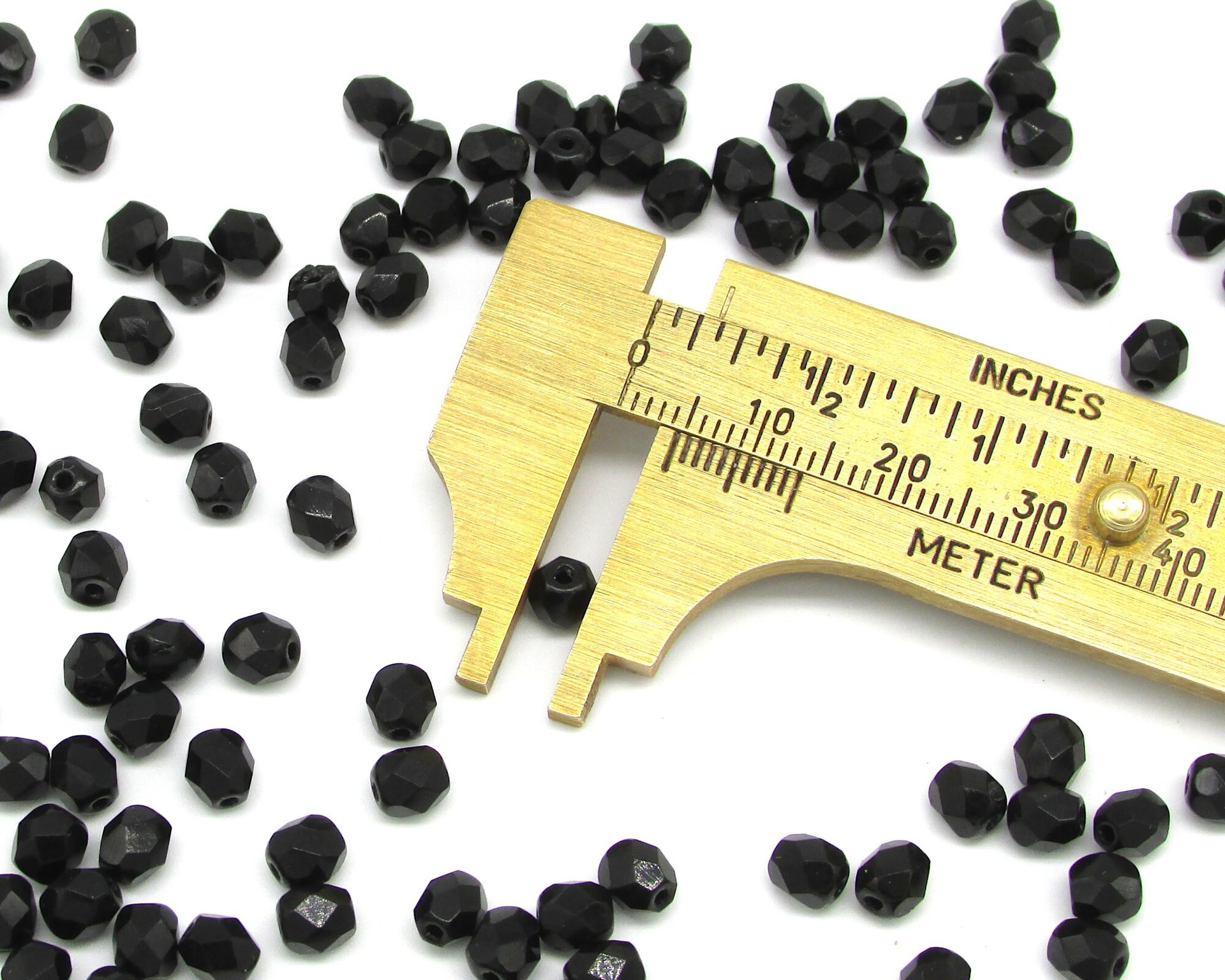 5x4.5mm Faceted Oval Beads, Opaque Jet Black Czech Fire Polished Glass