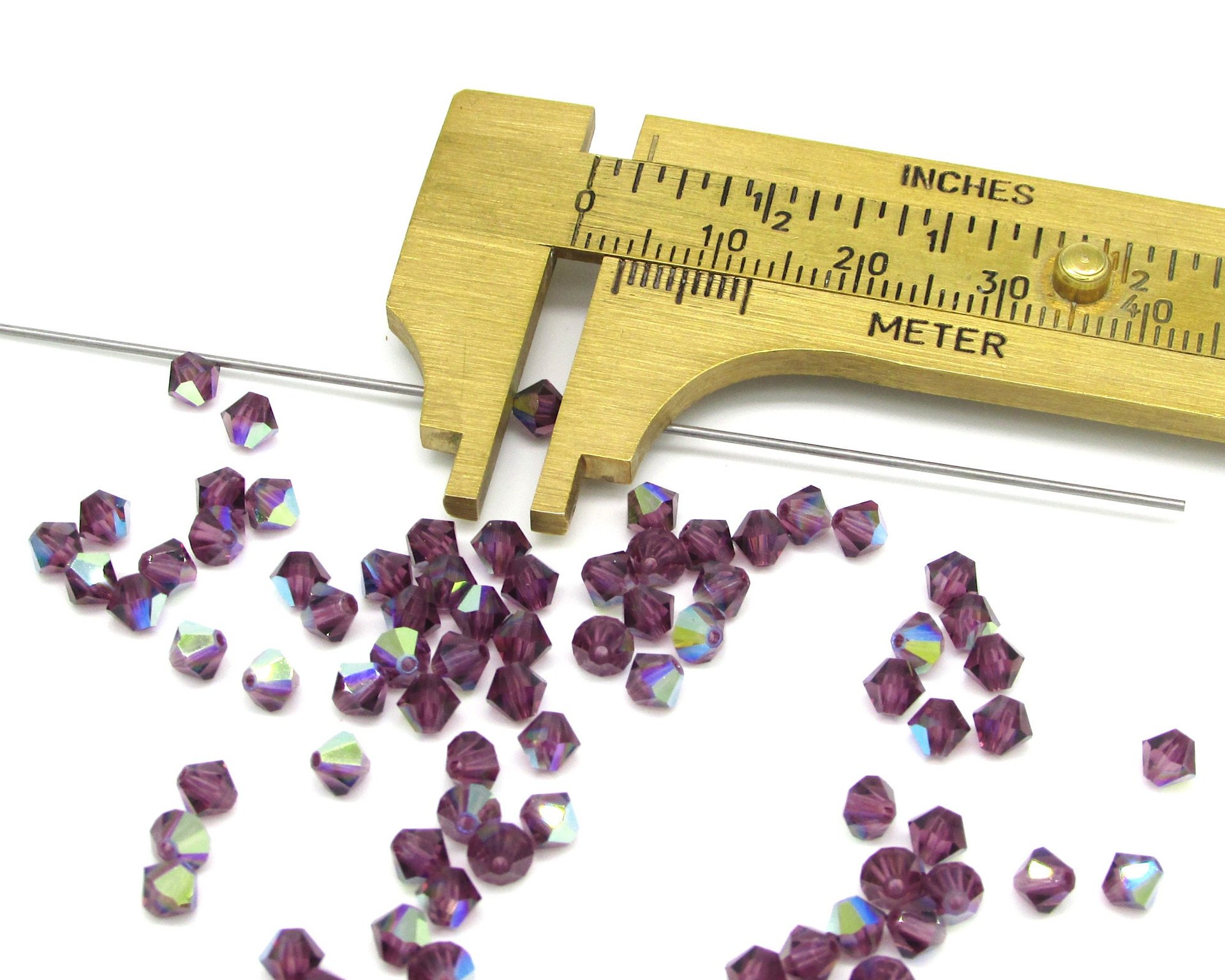 4mm Amethyst AB Bicone Machine Cut Crystal Beads