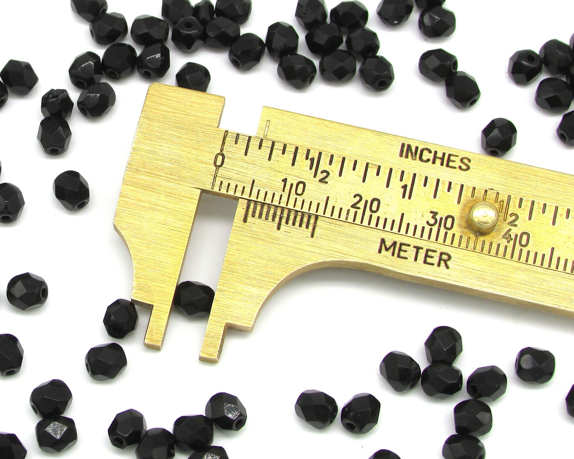 5x4.5mm Faceted Oval Beads, Opaque Jet Black Czech Fire Polished Glass