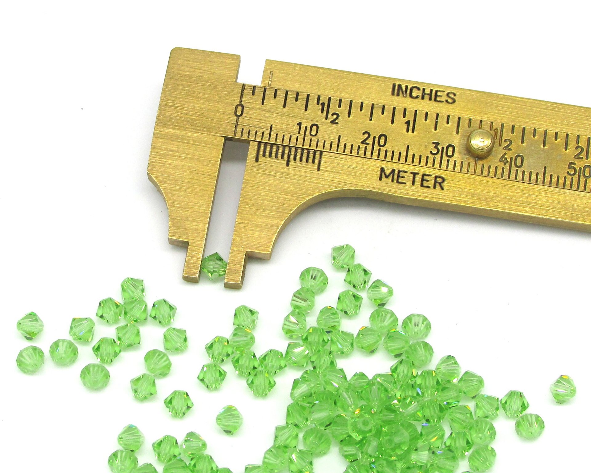 4mm Faceted Bicone Beads, Translucent Peridot Green Vintage Machine Cut Crystal Spacers