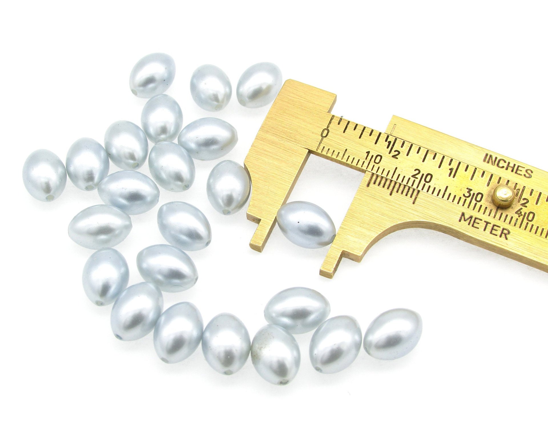 11.5x8mm Oval Rice Beads, Opaque Light Blue Vintage Faux Pearls