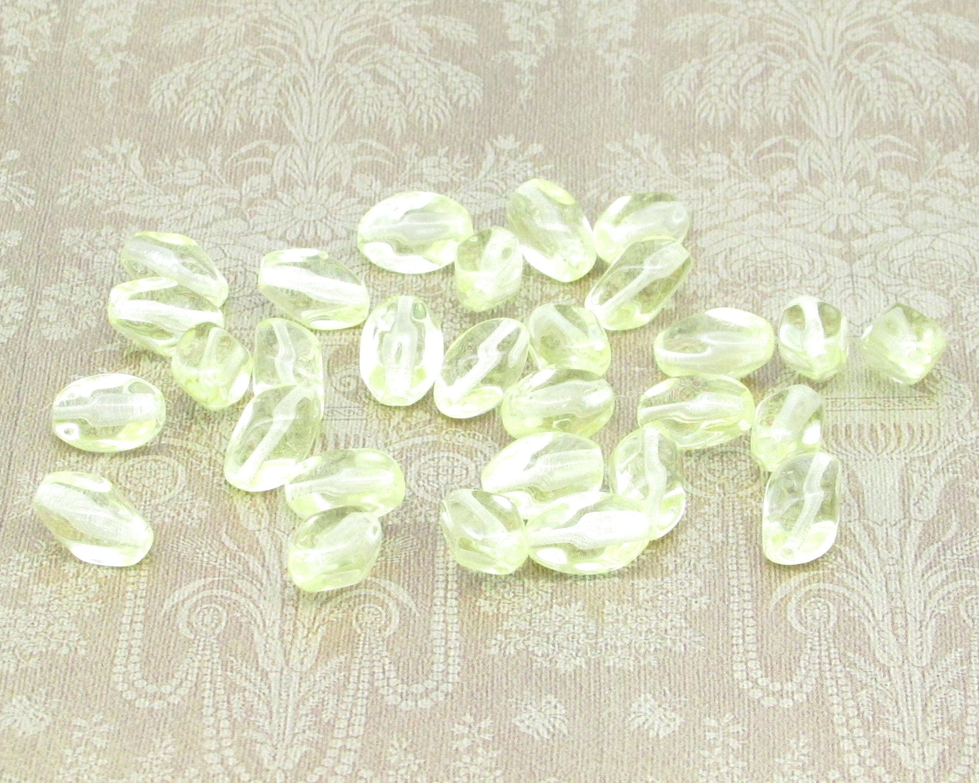 11x7mm Pinched Oval Beads, Baroque Barrels, Translucent Czech Pressed Glass