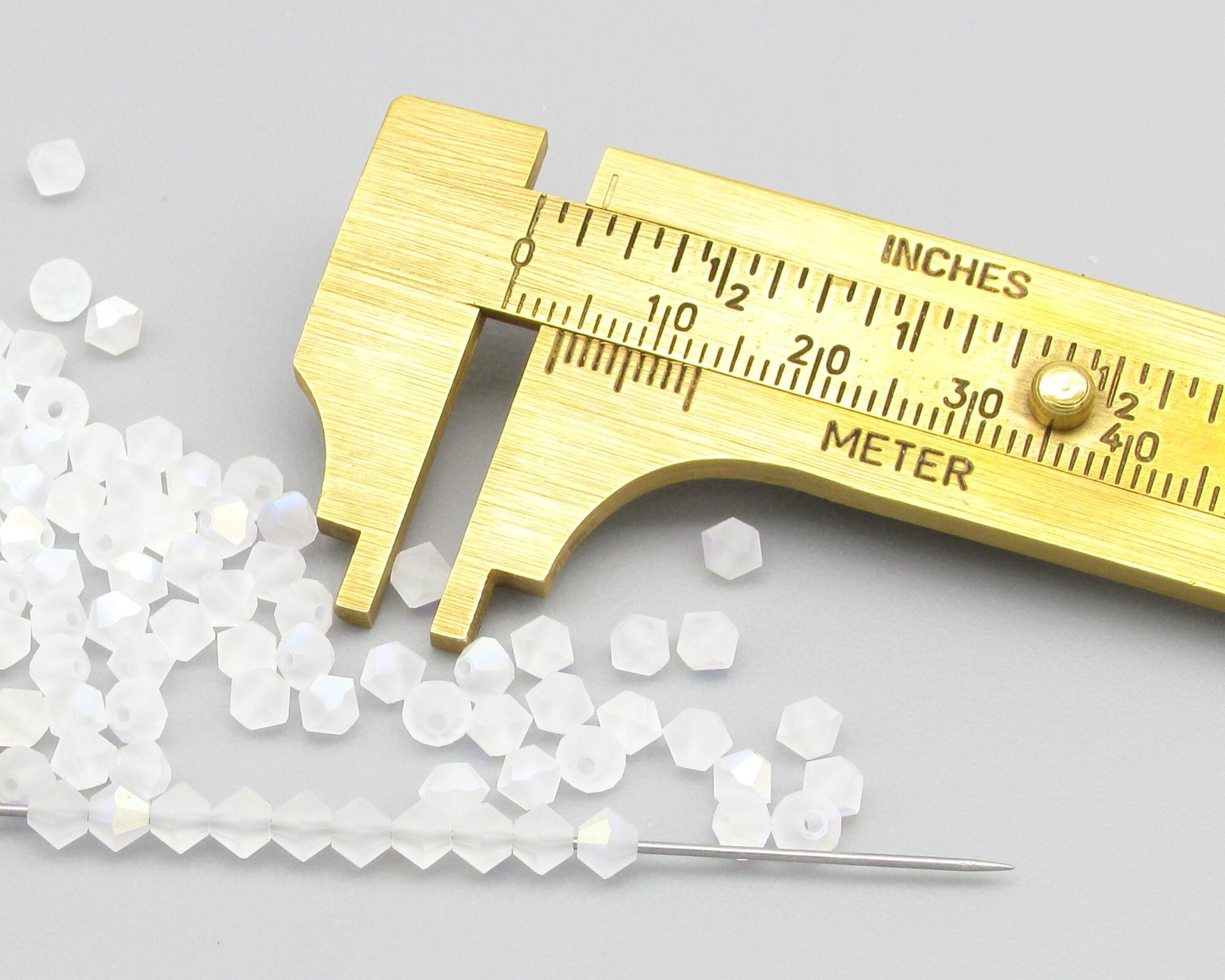 4mm Bicones, Matte Crystal AB Preciosa Machine Cut Tapered Beads