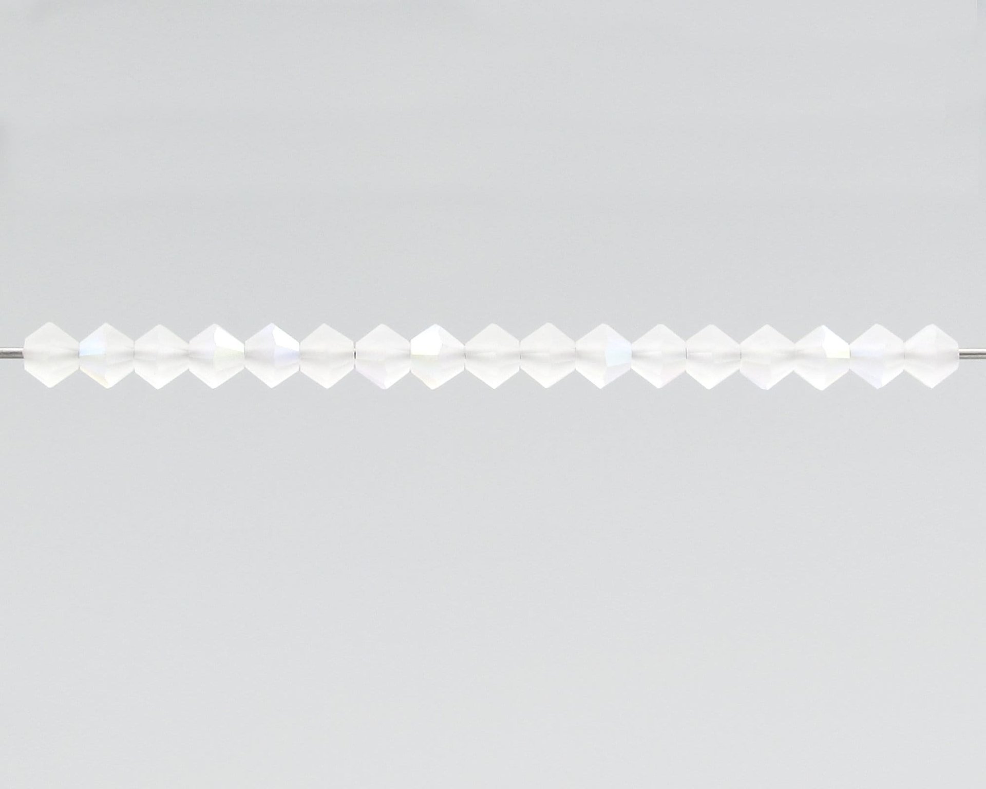 4mm Bicones, Matte Crystal AB Preciosa Machine Cut Tapered Beads