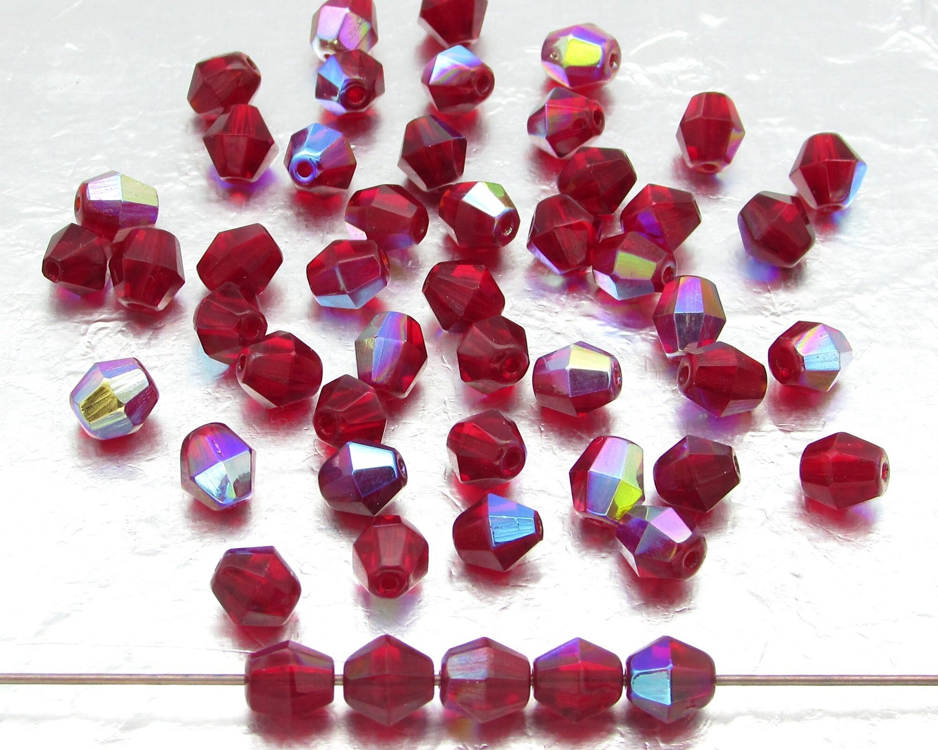 Vintage 6mm Siam AB Faceted Bicones