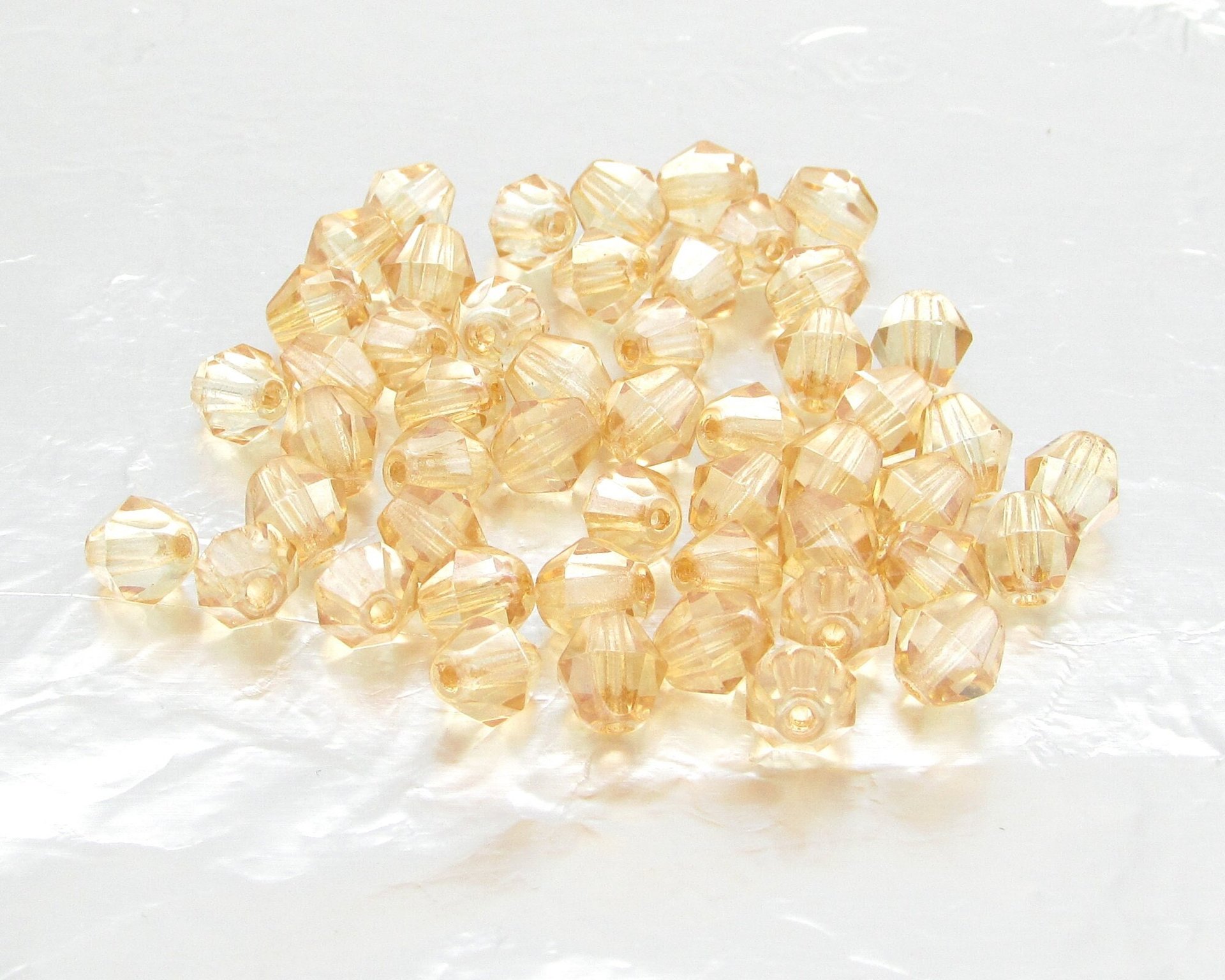 Vintage 6mm Faceted Bicones, Translucent Champagne