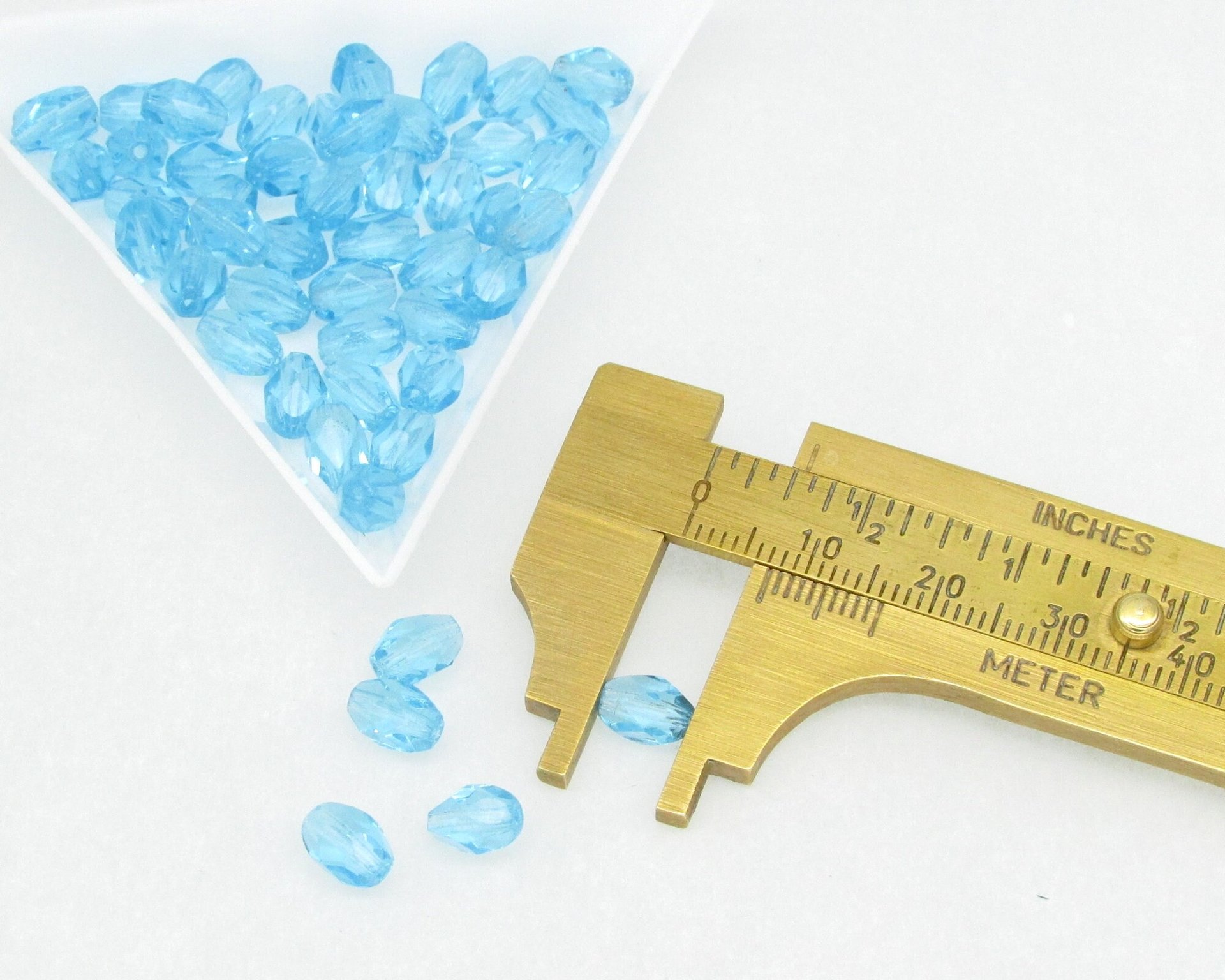 7x5mm Faceted Ovals, Translucent Aqua Czech Fire Polished Beads (50)