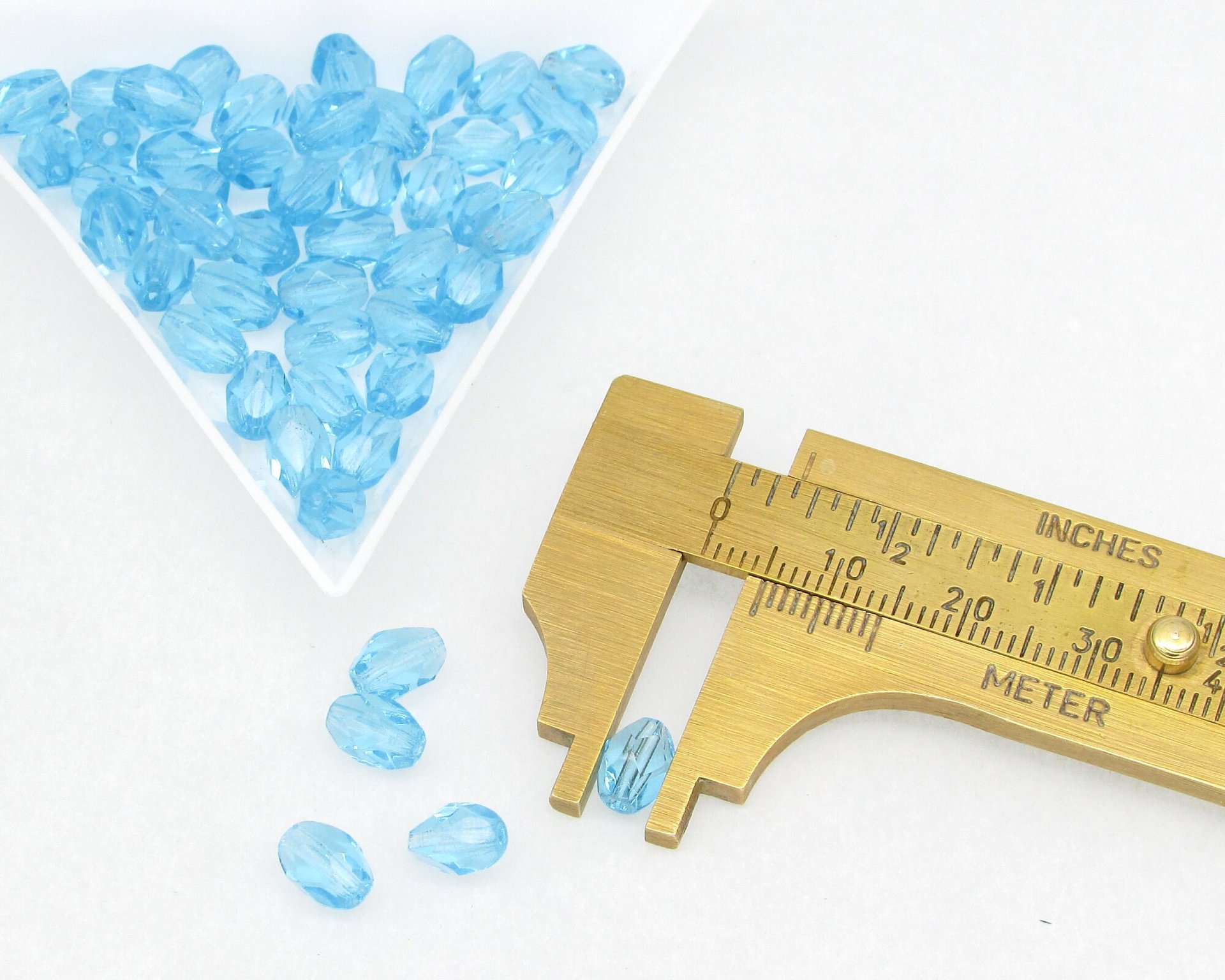 7x5mm Faceted Ovals, Translucent Aqua Czech Fire Polished Beads (50)