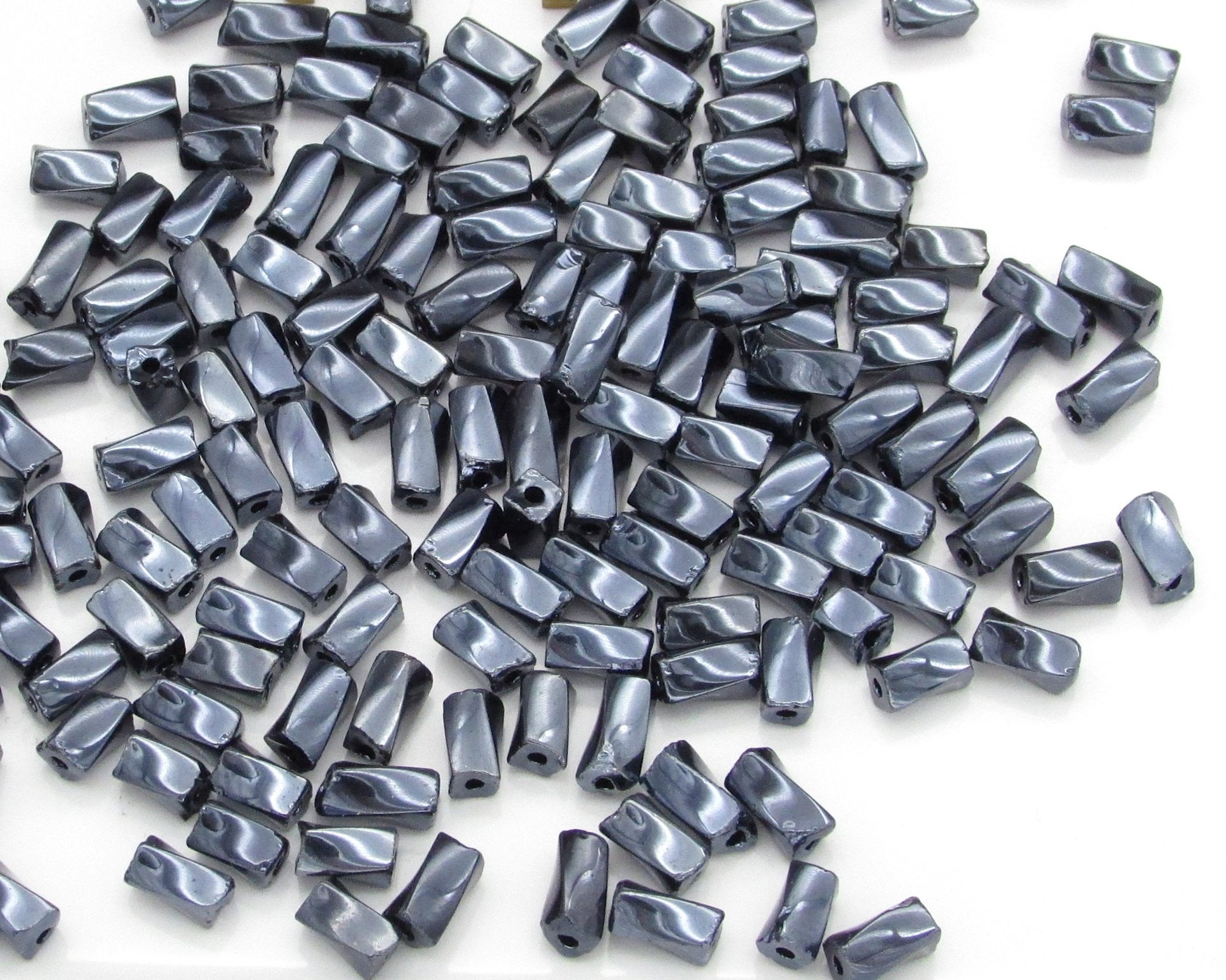 7mm Twisted Square Tube Beads, Opaque Gunmetal Gray
