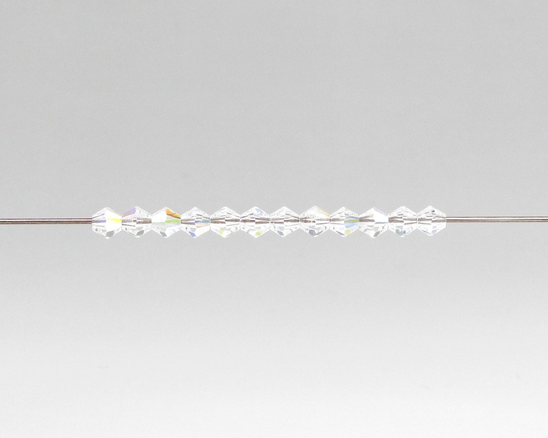 4mm Faceted Bicones, Crystal AB Vintage Preciosa Machine Cut Beads