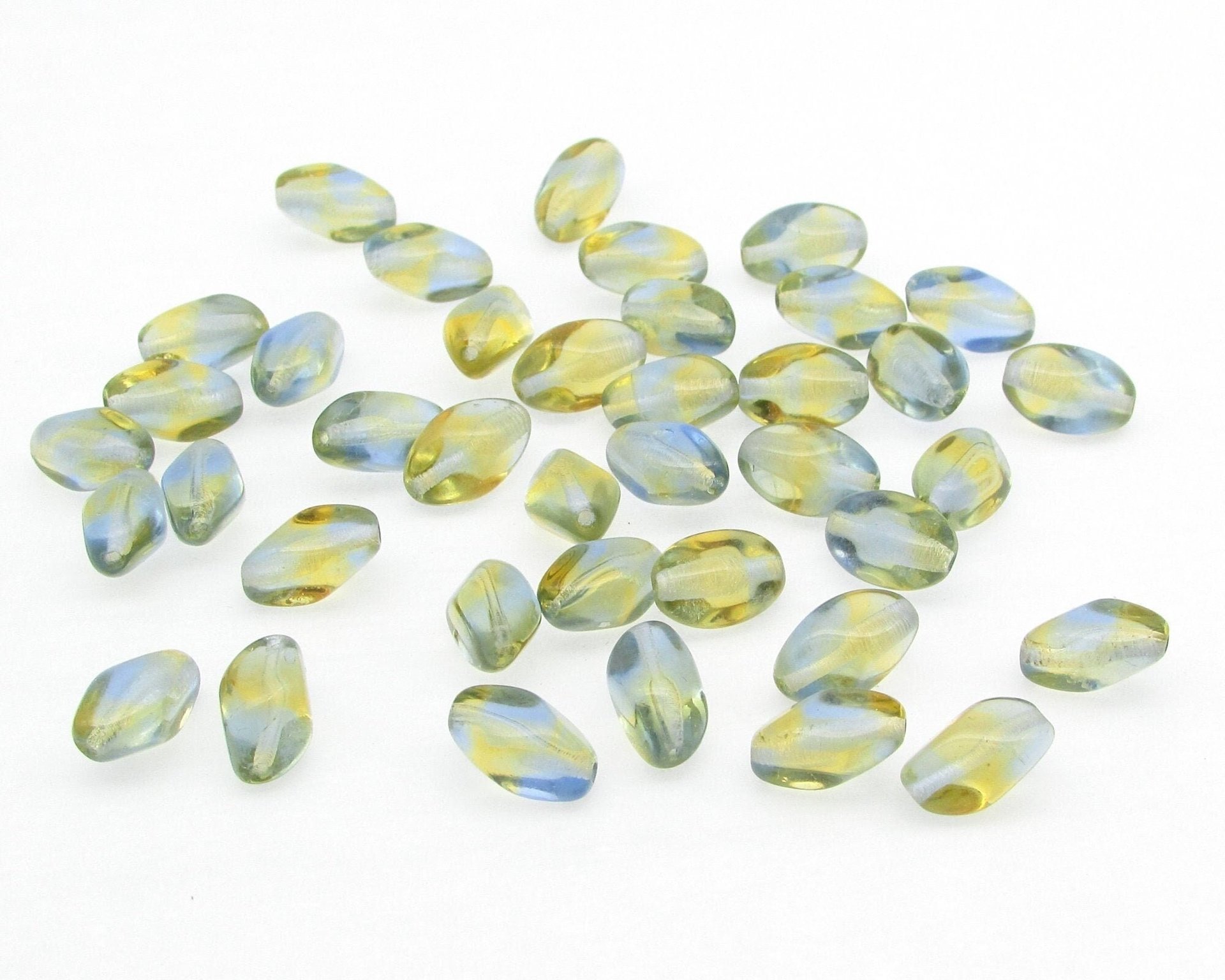 11x7mm Pinched Oval Beads, Baroque Barrels, Translucent Czech Pressed Glass