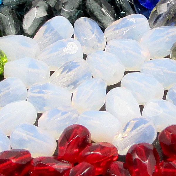 7x5mm Czech glass faceted beads are semi-translucent opaline teardrops with lengthwise 1mm diameter holes. These small, fire polished pear-shaped milky white beads can be used as spacers to contrast with larger crystal beads. 
